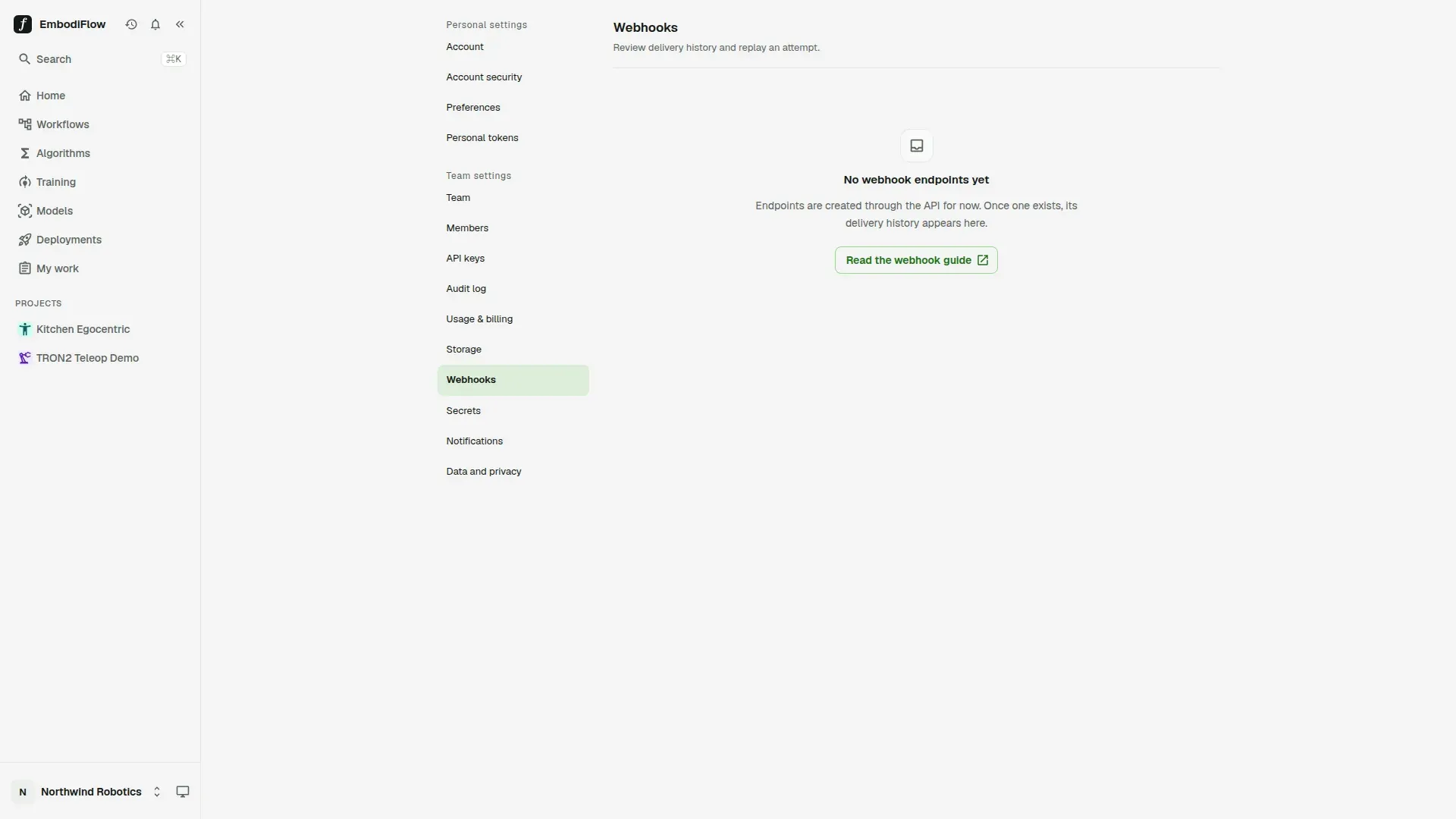 The Webhooks page in team settings with no endpoints yet: the message No webhook endpoints yet, a note that endpoints are created through the API for now, and a Read the webhook guide button