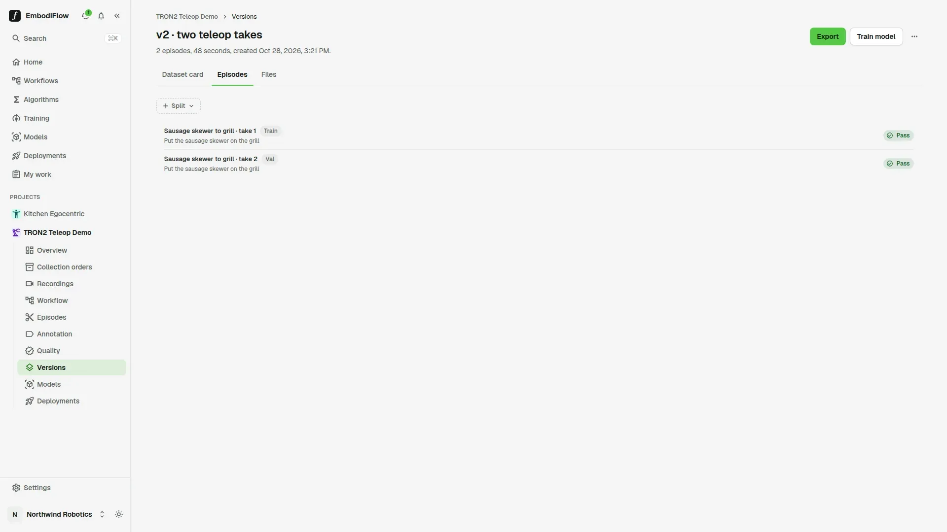Episodes tab of a version with two episodes, one in Train and one in Val, both with a Pass verdict